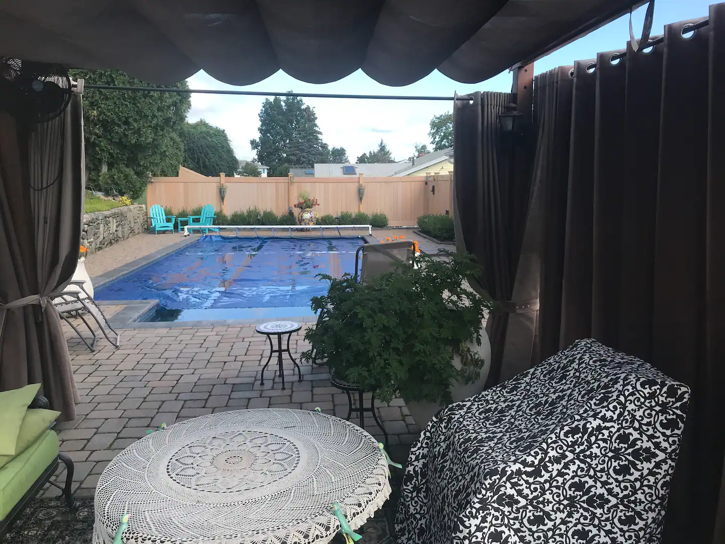 View of pool from gazebo. Swim, float, splash, and play in the 32,000-gallon, solar-heated pool.