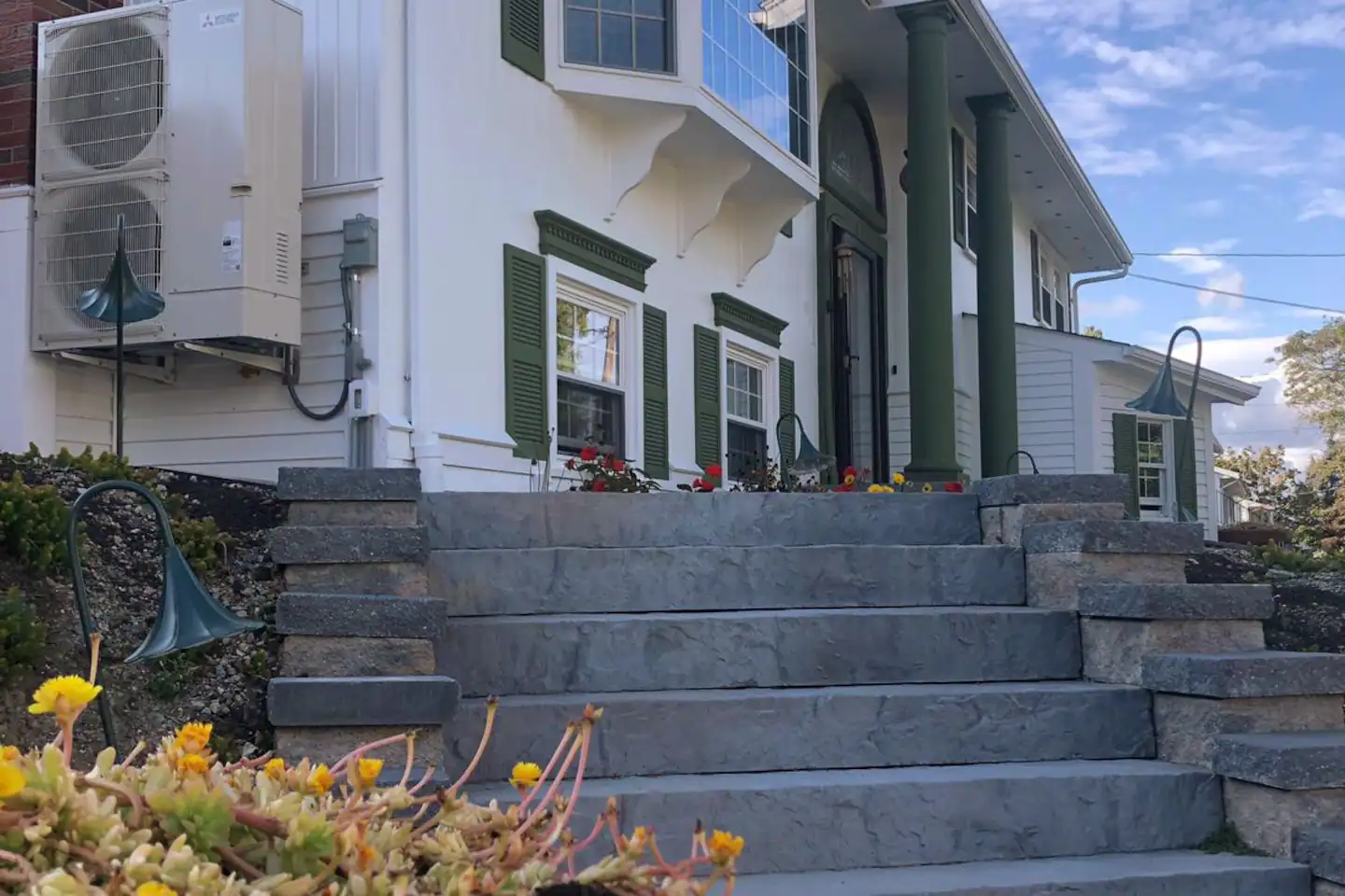 Entrance from driveway. 13 outside steps from your driveway to main level. Then another six outside steps to front door.